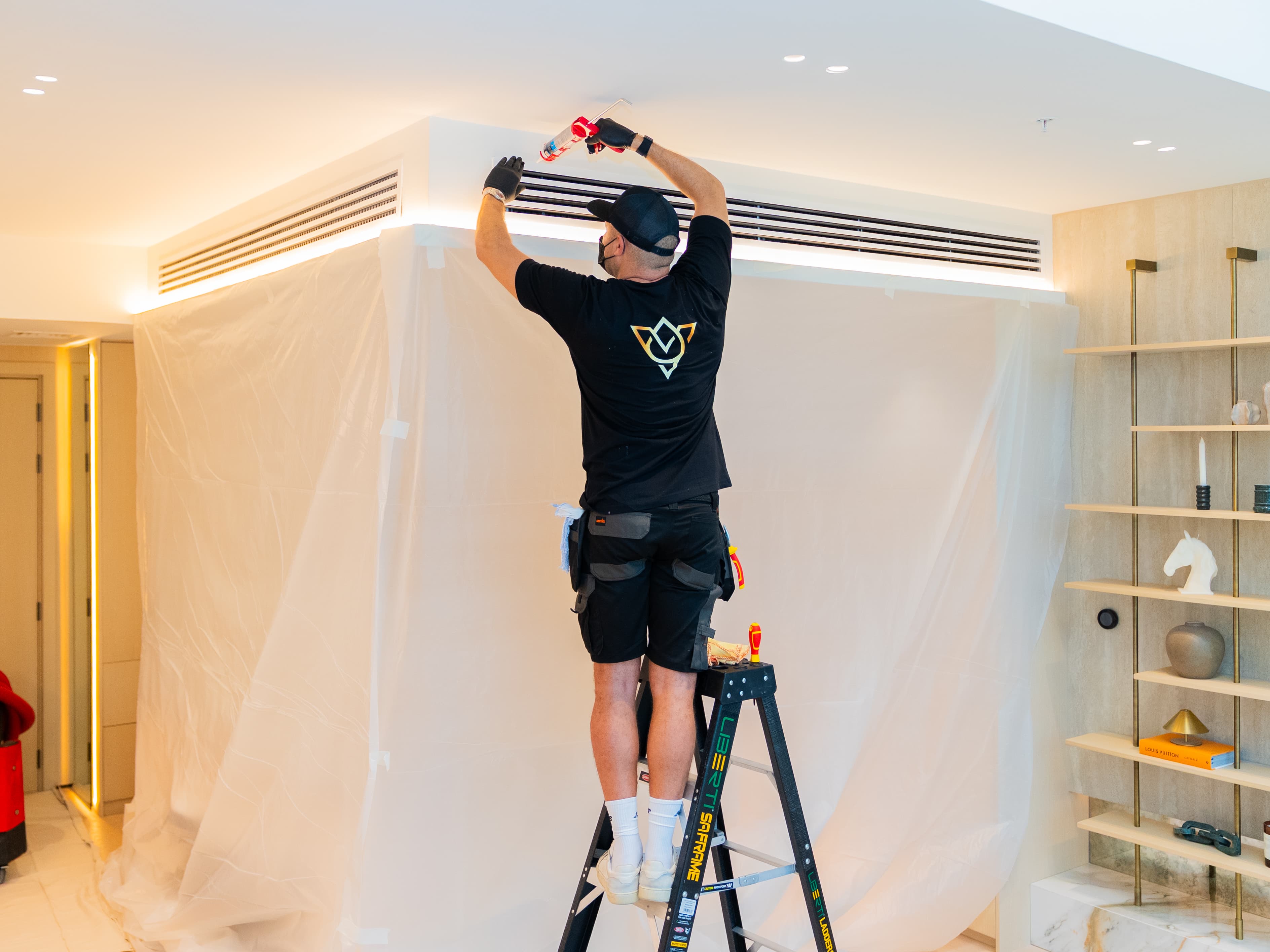 Vita Technical engineer inspecting HVAC system in a Dubai property